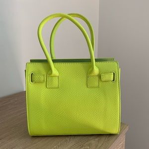 Neon yellow snake skin textured purse
